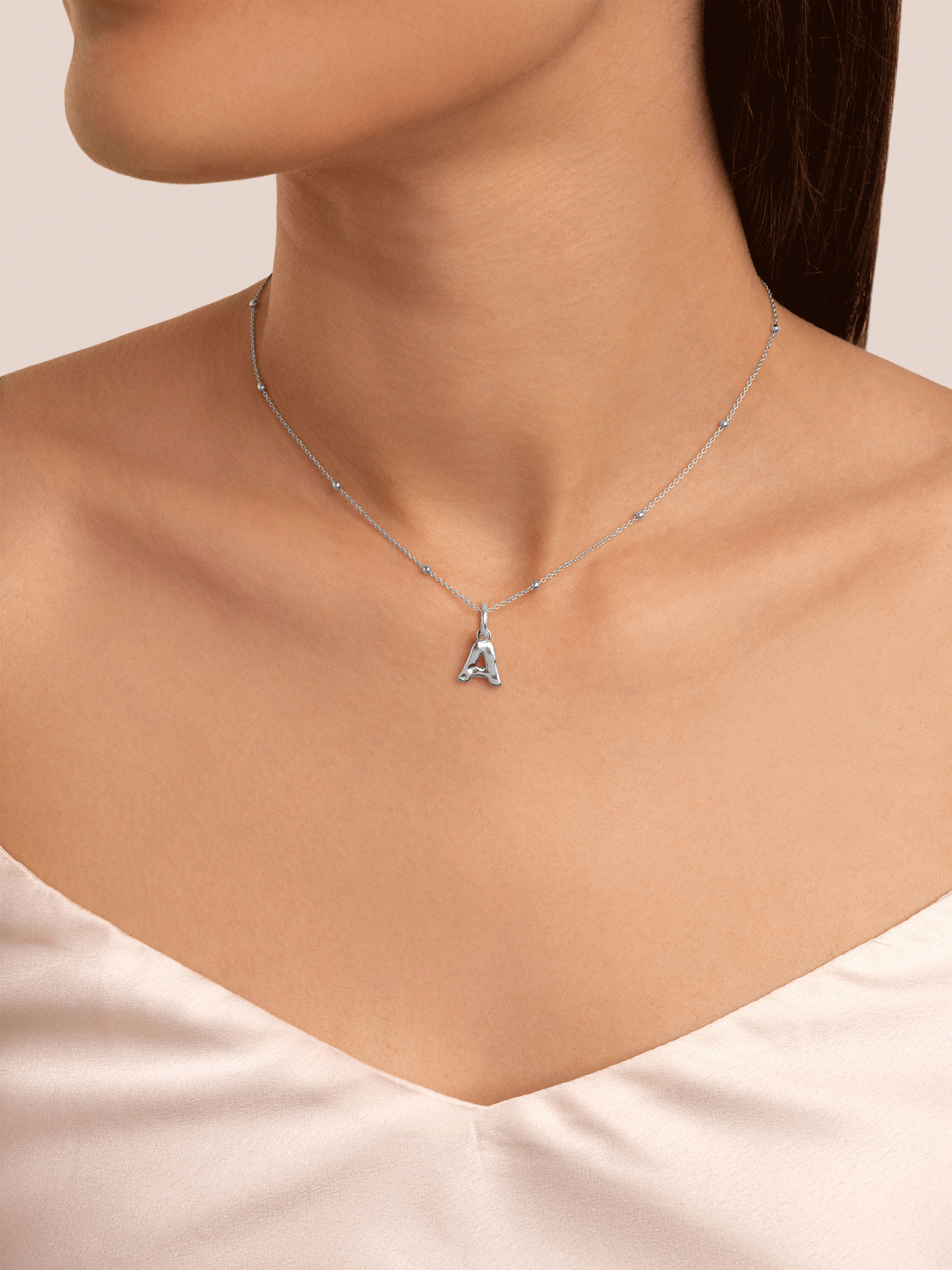 Letter Organic Silver Charm