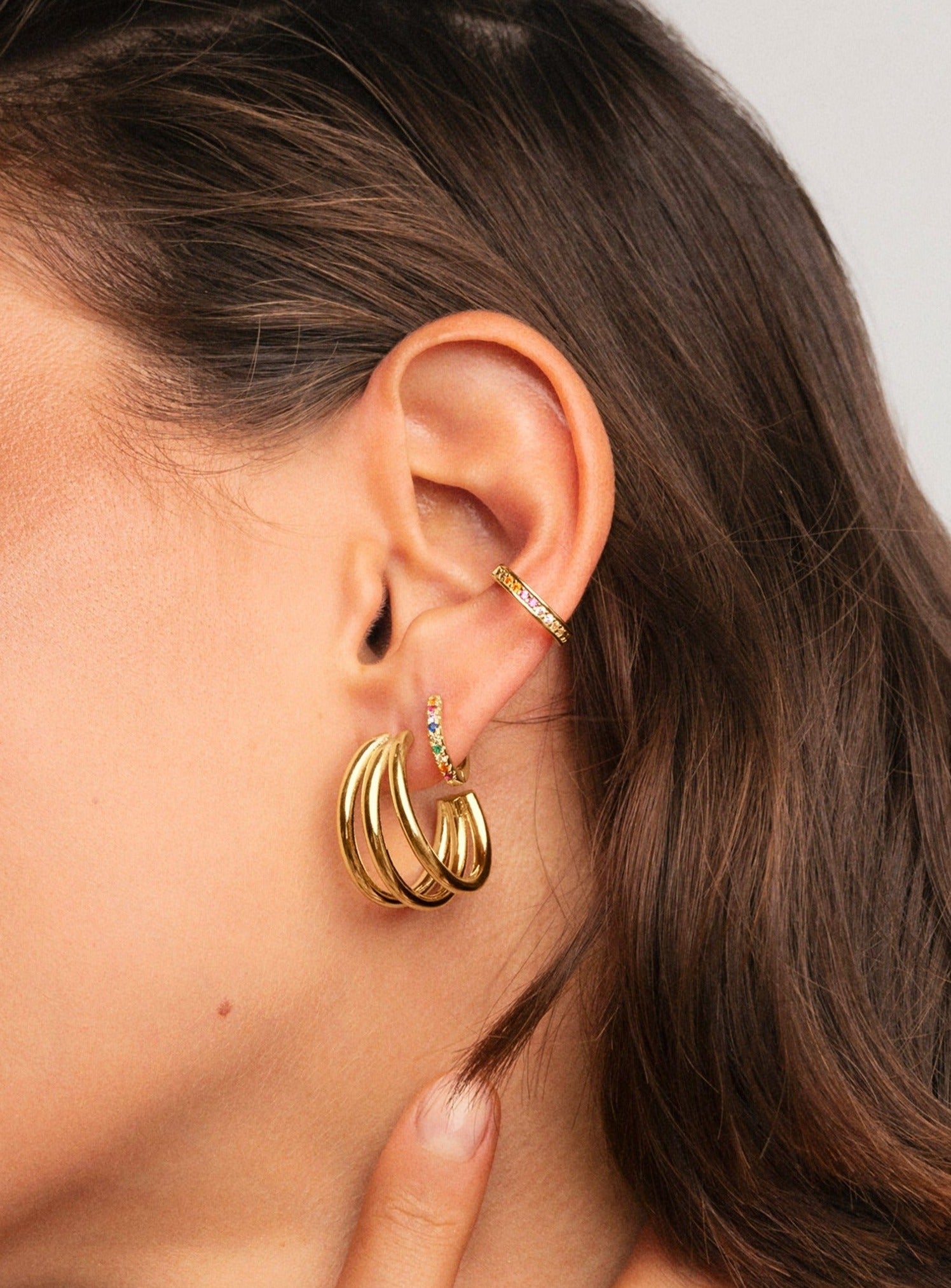 Gold triple hoop on sale earrings