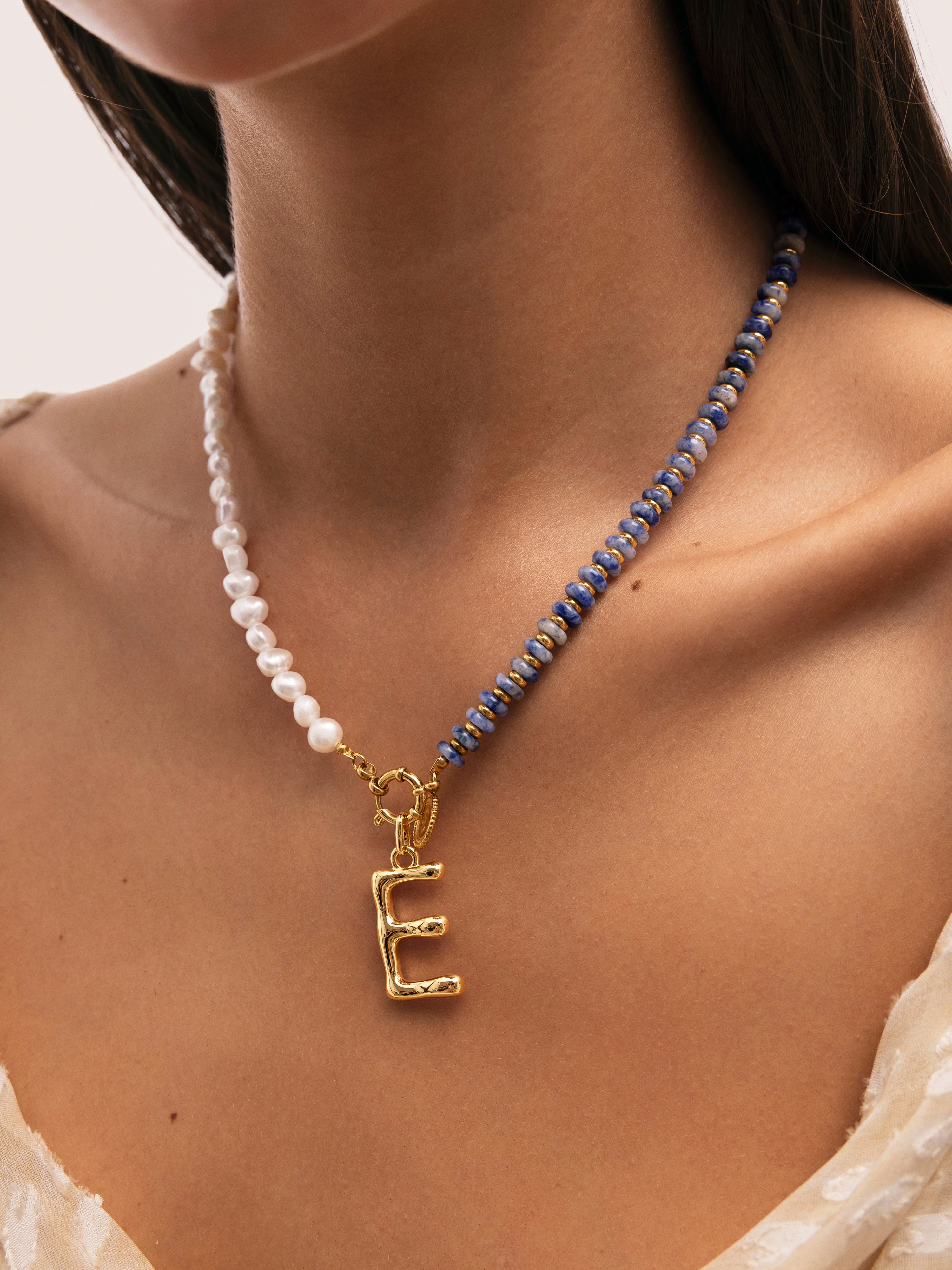 Collar Índigo Pearl Acero Baño Oro