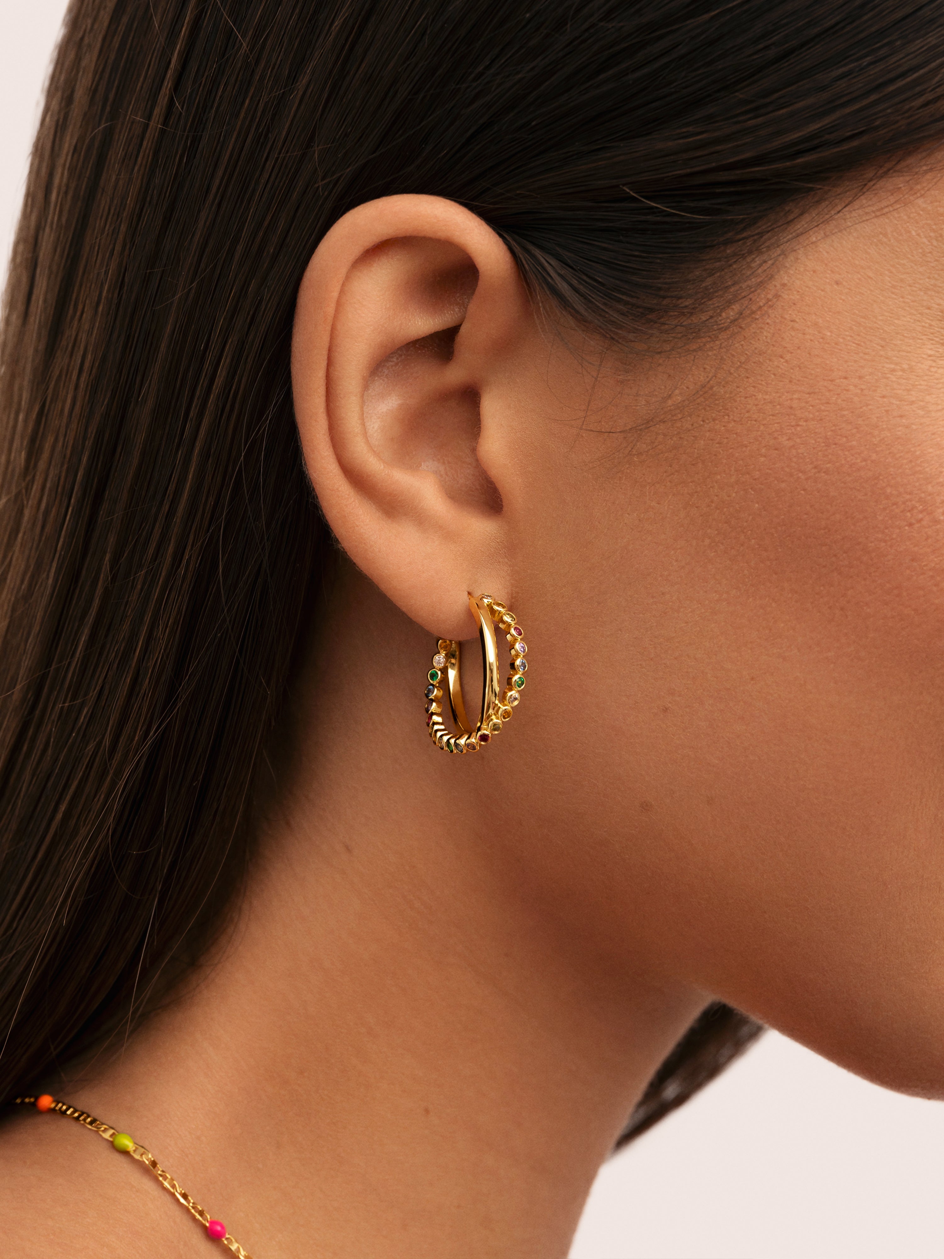 Pendientes Orbit Cross Baño Oro