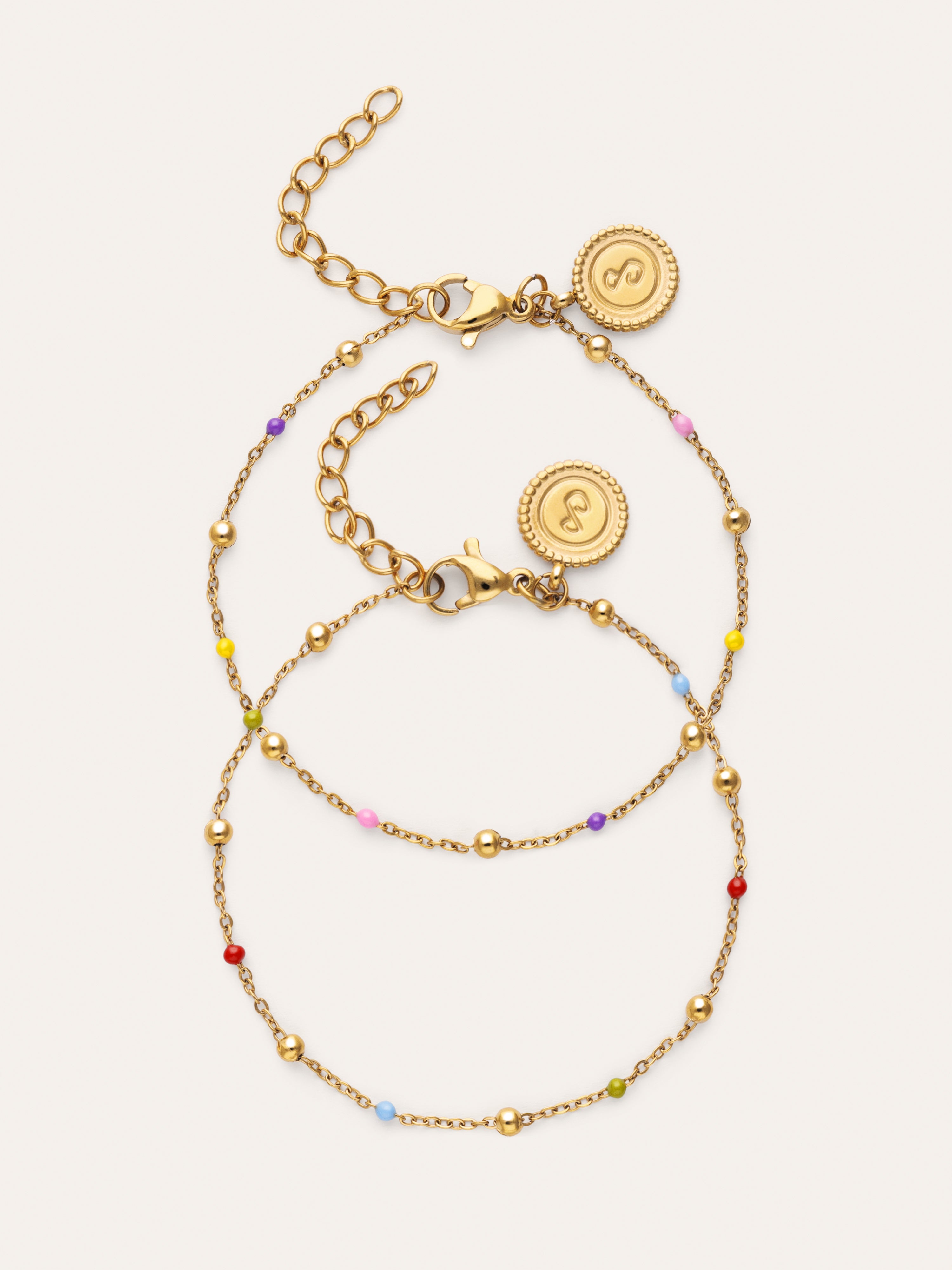 Pack 2 Pulseras Amistad Colores Acero Baño Oro