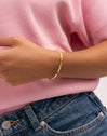 Alma Rose Gold-Plated Cuff Bracelet - puesto en modelo