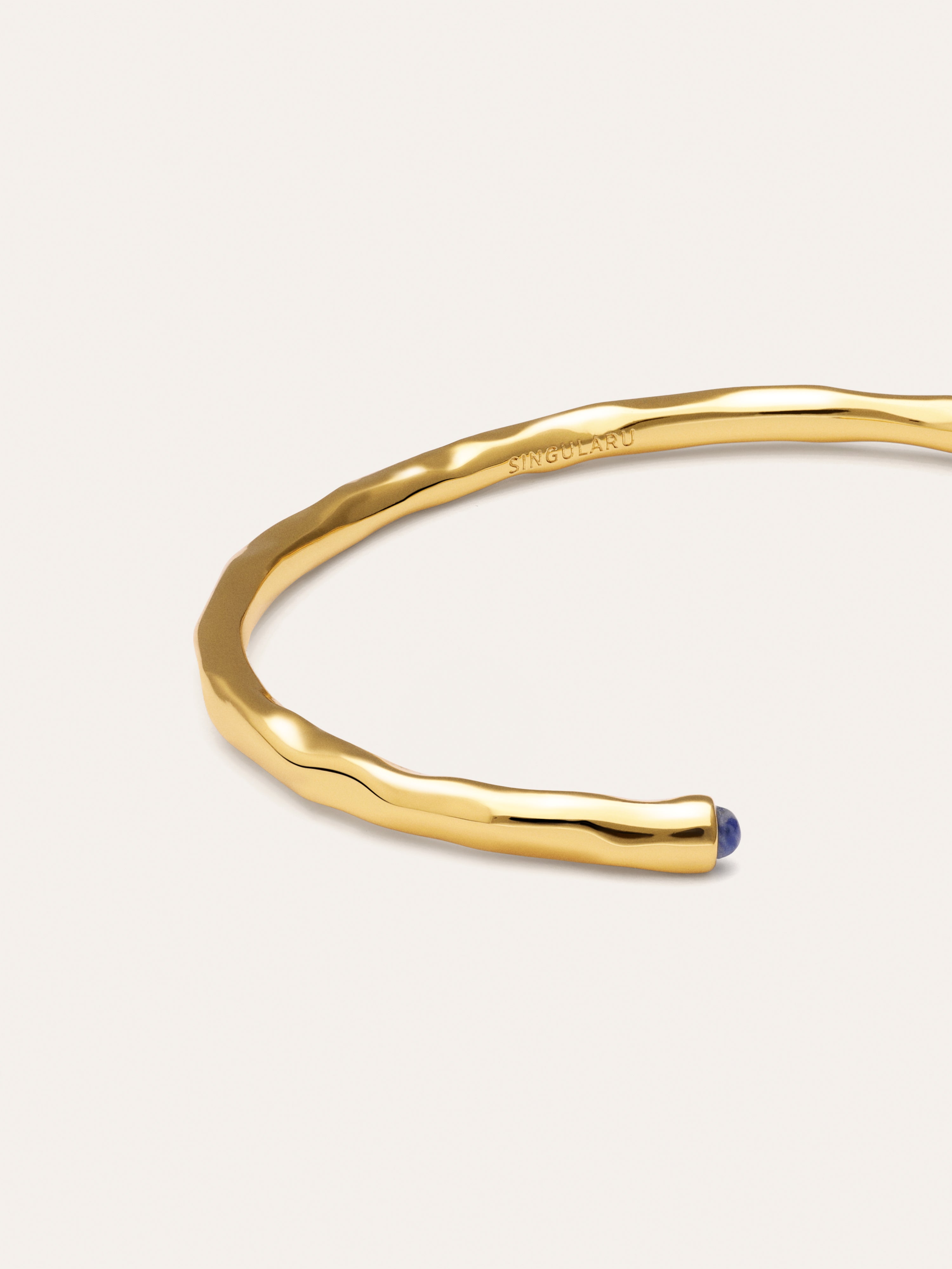 Brazalete Cane Cianita Baño Oro