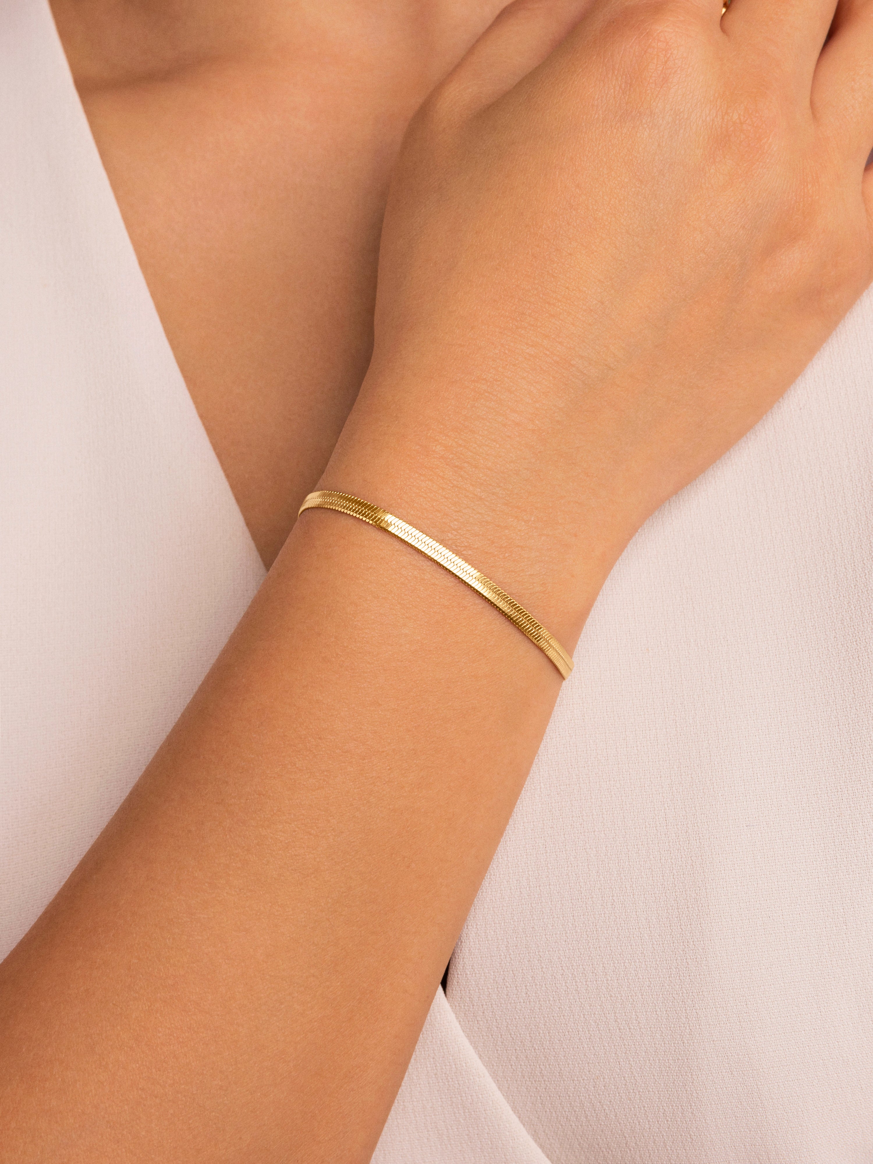 Gold steel store bracelet