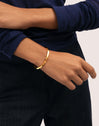 Brazalete Lizze Acero Baño Oro - puesto en modelo