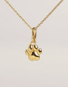 Charm Simple Paw Plata Baño Oro