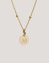 Mini Medallion Letter Acero Baño Oro